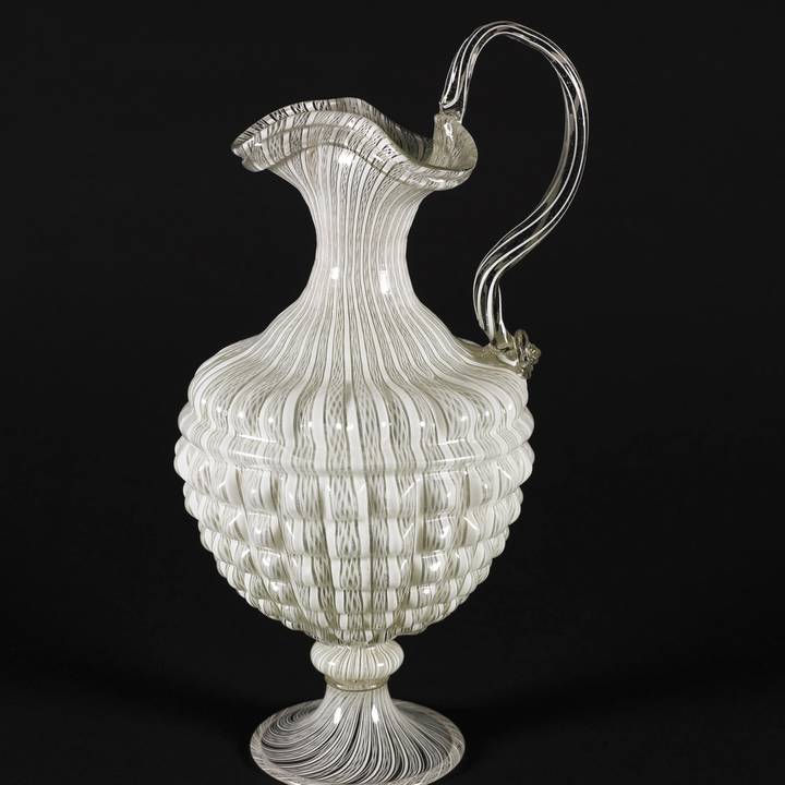 Photograph of a white patterned Venetian glass vessel