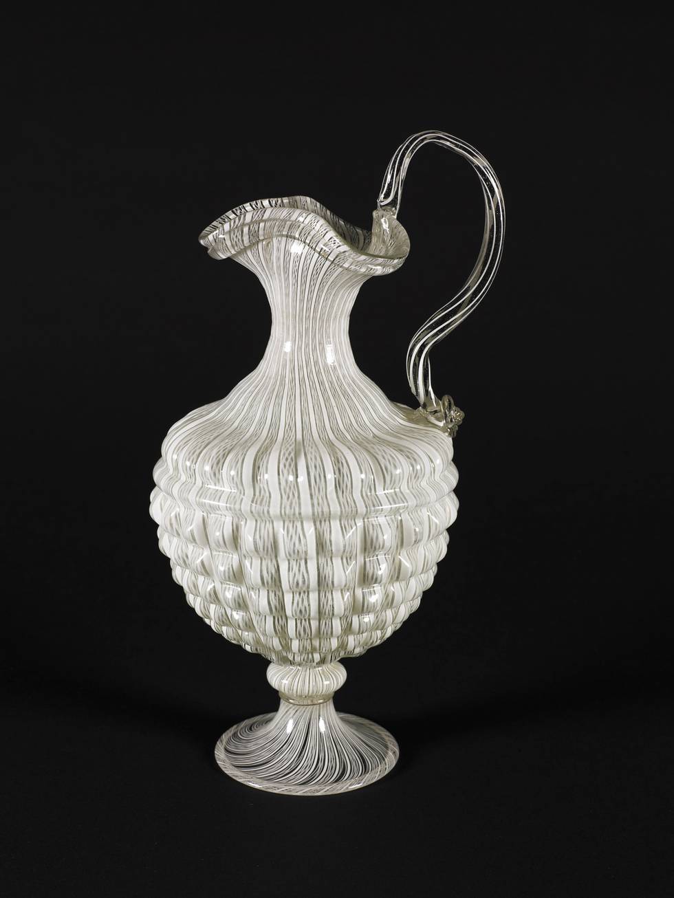 Photograph of a white patterned Venetian glass vessel