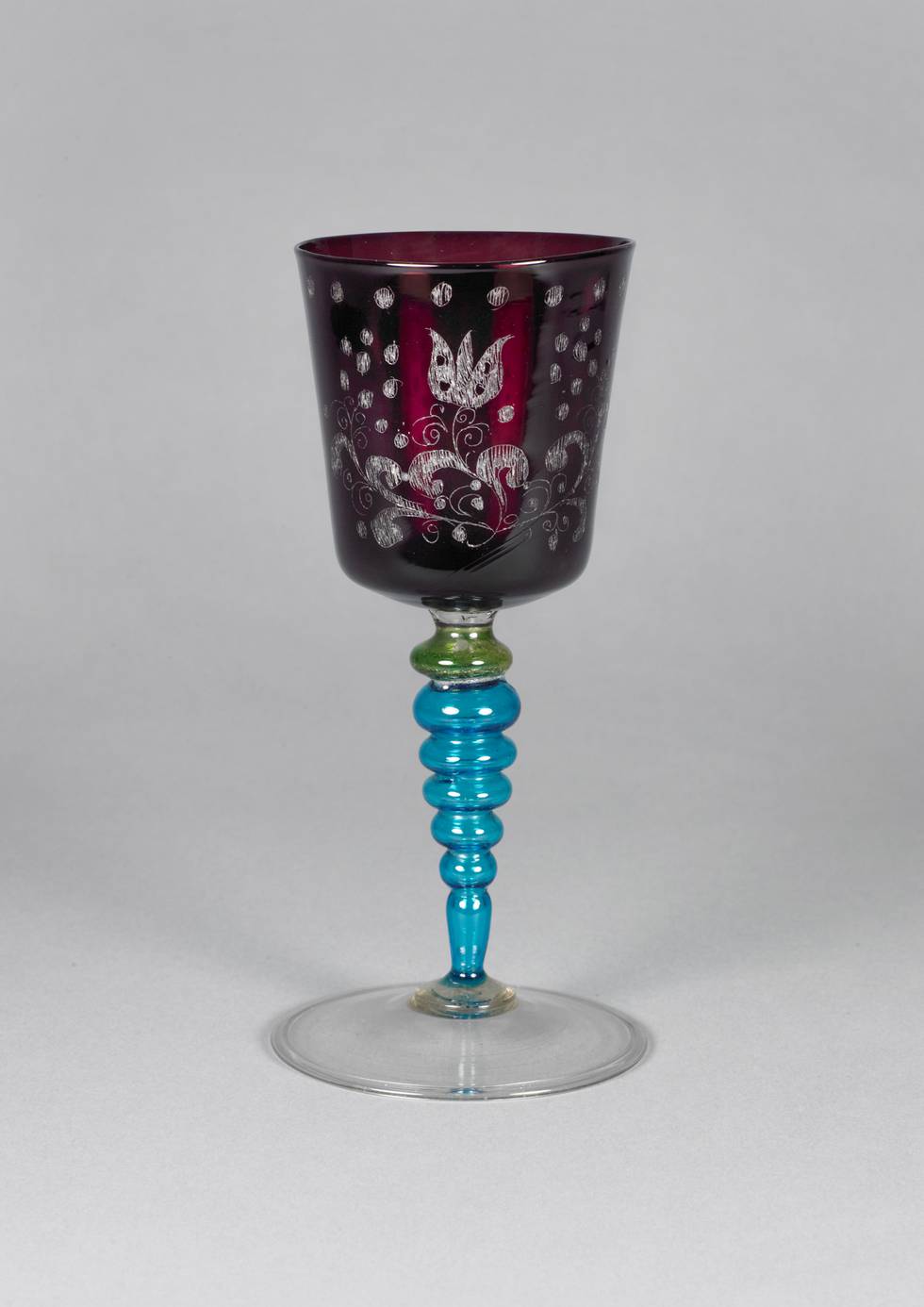 Venetian glass vessel with a blue stem and a red cup