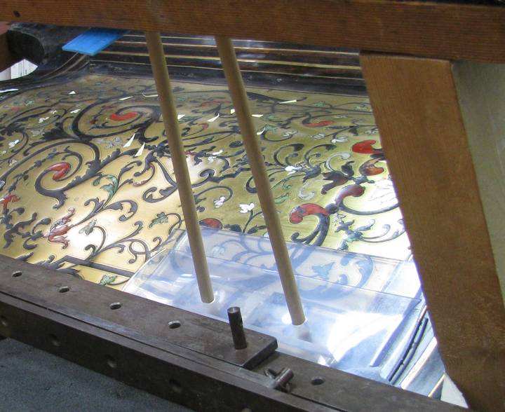 Detail of chest of drawers (F406) during the re-hydrating and clamping of the loose marquetry.