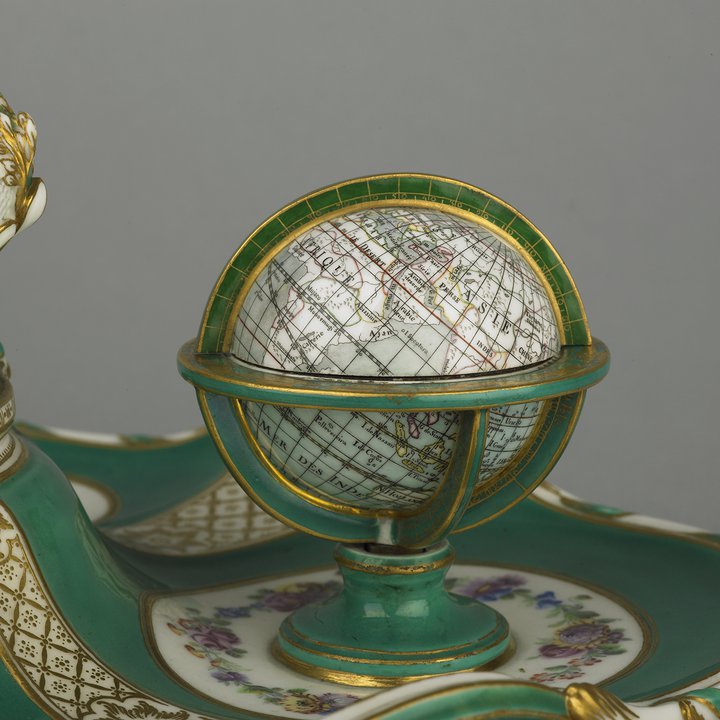 A detail of a porcelain inkstand