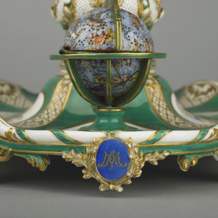 A detail of a porcelain inkstand