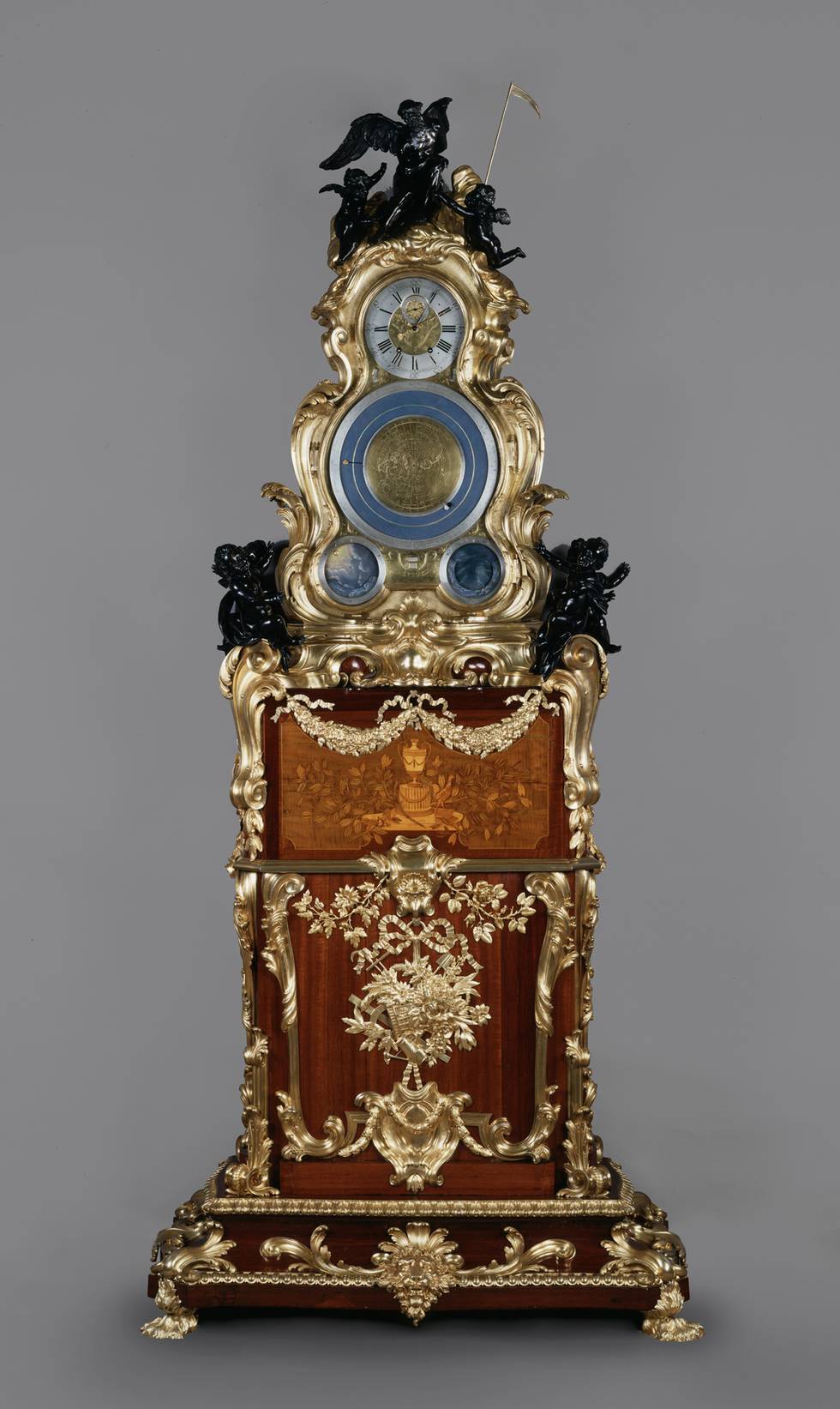 Wooden and gilt bronze clock, with four dials on front