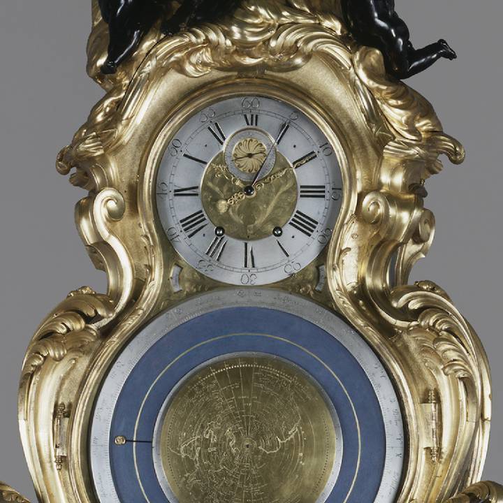 Gold and blue clock face and astronomical dial
