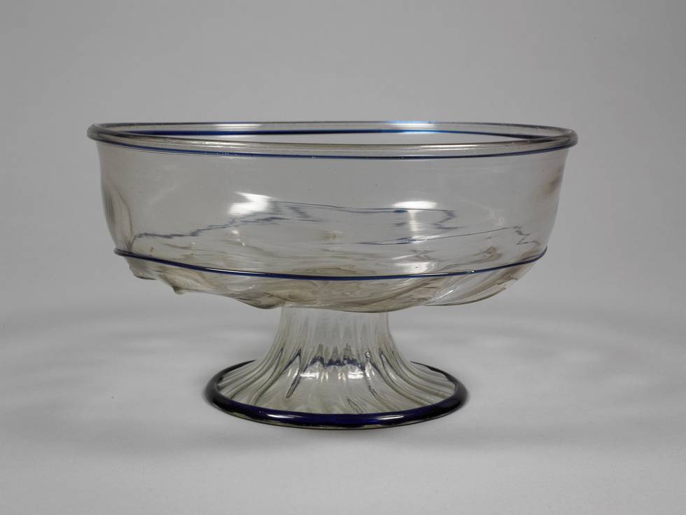 Wide glass dish with a blue hue