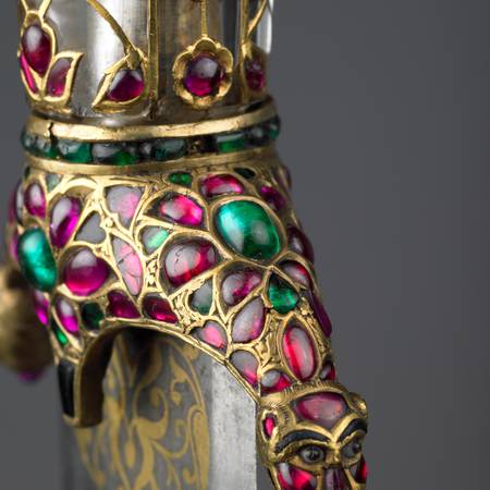 A detail of a jewelled dagger