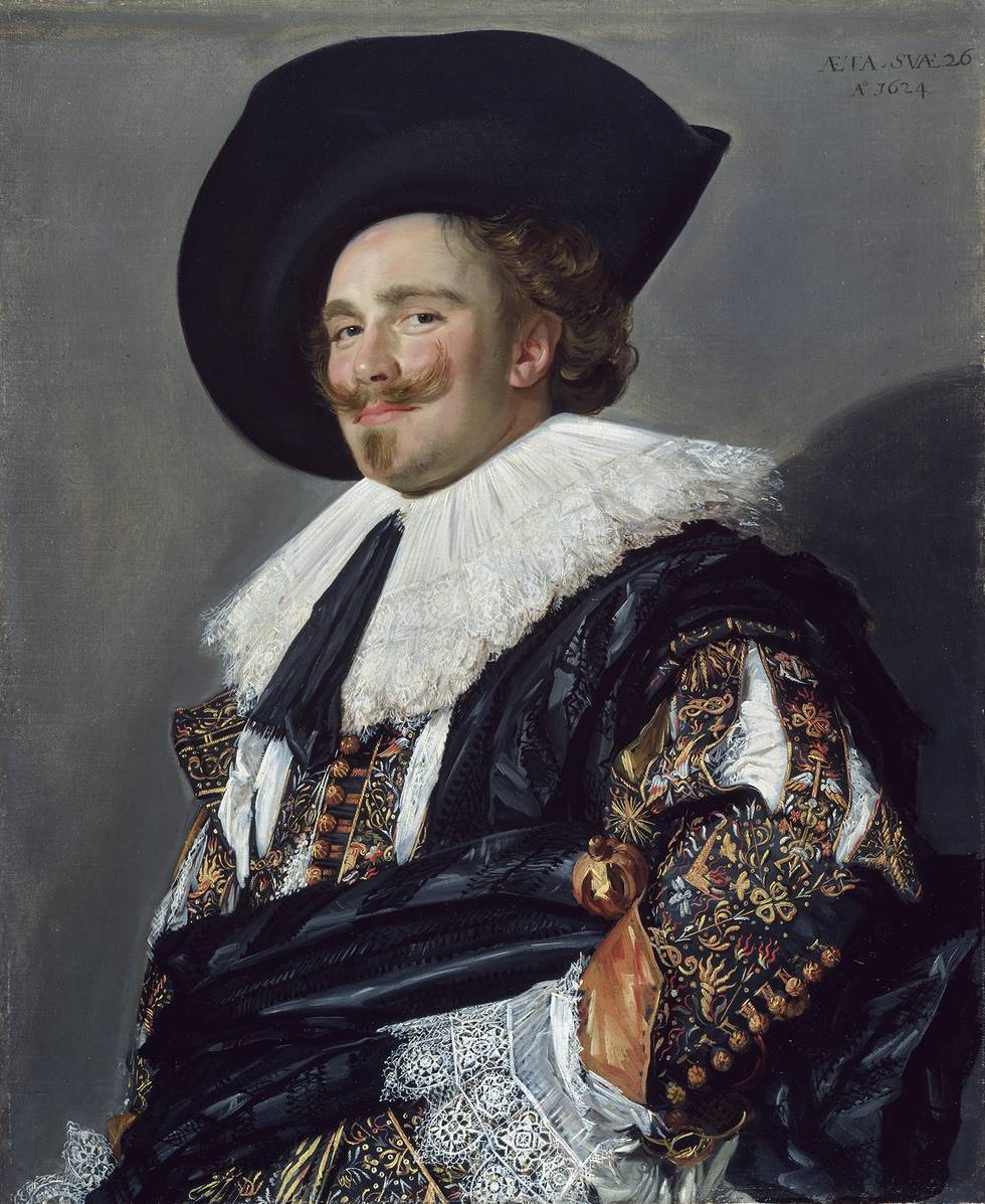 A portrait of a man wearing a hat