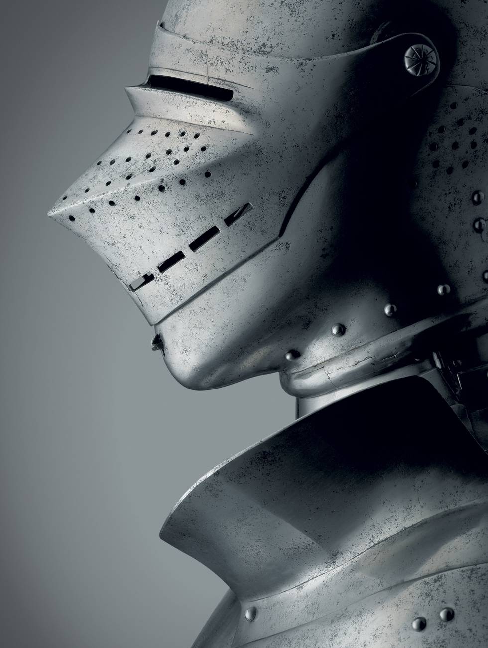 Side profile photograph of a medieval helmet