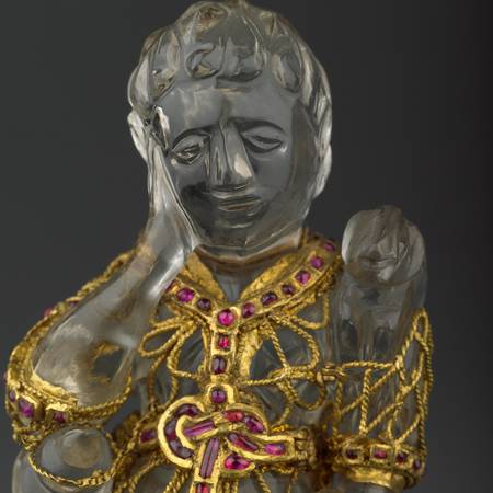 Three-quarter length of statue of christ as a Shepard, decorated with gold and jewels
