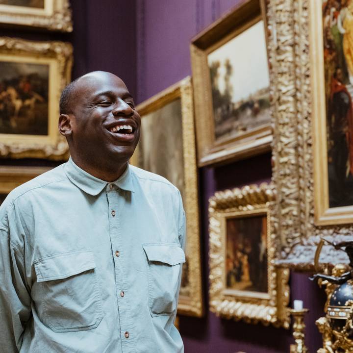 man smiling in gallery